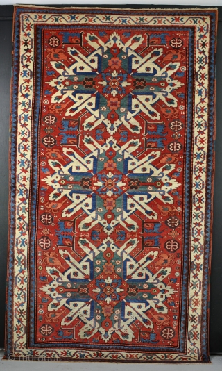 Super-fine eagle Kazak with unusual colour pallete  and very unusual border. Has great wool and all vegative dyes. Mostly in good pile, down to the knot collars in places. 237x122cm Circa  ...