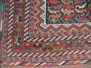 An old Khamseh bird rug. mainly in good pile but slight local mothing down one side and some bad red dye. Circa 1910.          