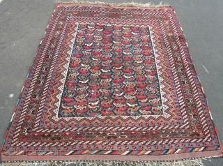 An old Khamseh bird rug. mainly in good pile but slight local mothing down one side and some bad red dye. Circa 1910.          