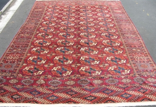 a Fine old Tekke main carpet with good dyes and shiney wool in mint condition with no repairs. Very crisp clean piece. 10x7. late 19th century.       