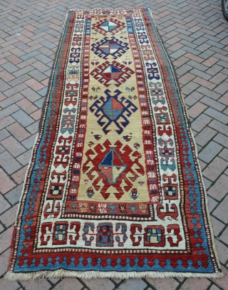 Antique Shasavan long rug on a rare yellow ground. Chunky and funky, with some white cotton pile. Pretty much full pile. 19th century. 307x106cm         