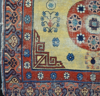 Antique Khotan, some wear wear but nicely drawn on bright yellow ground. Late 19th century.                  