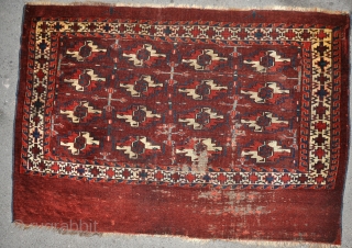 Antique Yomud group Chuval with oodles of offset knotting, a classic salt and pepper back and rich colours. There is some very fine cotton in the wefts. Some wear, slight staining in  ...