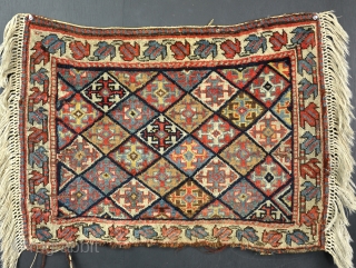 Unusual South Persian bag with lots of camel. Made ito a little rug! Tatty round edges but with good dyes and real age. 19th century.        