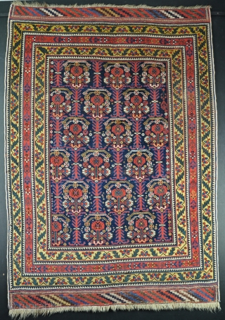 An antique Afshar rug with good dyes and lovely sumac ends. Even low pile, some corrosian to browns. Sides overbound. Liberal use of yellow. 19th century. 173x122      