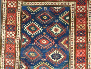 A good Genge/Kazak rug with vivid dyes including nice nice purple and lovely wool. Minimal restorations, very clean and jewel like piece. 19th century. 215x132cm        