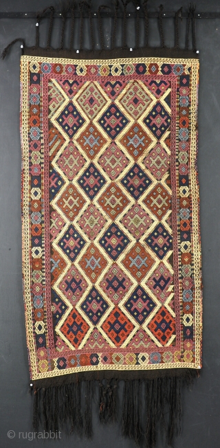 An antique Verneh cover(?) unusual small size with organic dyes in excellent original condition.  Late 19th century. 142x77cm              