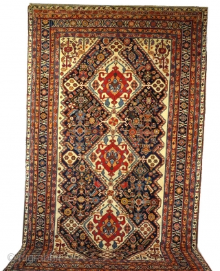 A very good antique Qasgai carpet. Great wool and colour, bigger than usual and beautifully drawn. Mainly in full pile, small amount of top flight repiling to frayed end, otherwise original condition.  ...