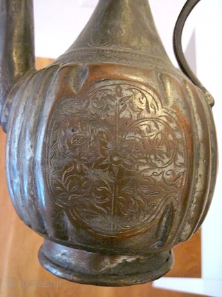 Middle Eastern ewer, copper, c. 1800, w/ hammered floral decoration.                       