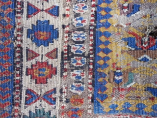 Caucasian Soumac fragment, late 19th century, 2-5 x 3-8 (.74 x 1.12), great greens and yellow, cut and rejoined, worn, holes, rug was washed, plus shipping.       