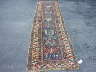 Caucasian Shirvan runner,  3-1 x 10-8 (.94 x 3.25),  circa 1870, great colors, wear, both edges rough in places, one end missing minor guard border, browns and blacks oxidized, many  ...