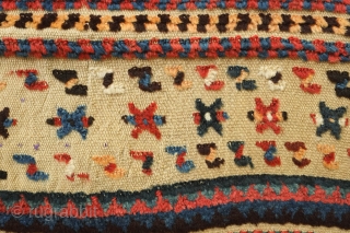 Qashqa'i horse cover, late 19th century. Beautifully saturated naturally dyed motifs. The flaps are different in design from one another. a bit of repiling in the left hand flap visible in the  ...