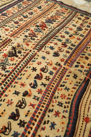 Qashqa'i horse cover, late 19th century. Beautifully saturated naturally dyed motifs. The flaps are different in design from one another. a bit of repiling in the left hand flap visible in the  ...