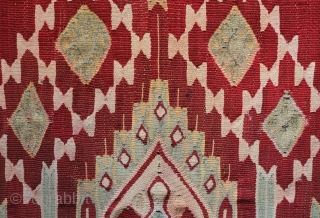 Syrian hanging, 19th century.  Fine wool base in madder and some design elements in cotton.  Design elements in the center recall pre- and early C.E. Central Asian motifs. 
 Mounted  ...