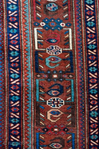 Khamseh Rug, Late 19th/early 20th Century.  Fantastic deep indigo blue ground.  Exceptional border.  Natural colors.  Possibly Arab Jabbareh group but the knots are symmetrical.  171 x 212  ...