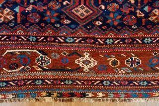 Khamseh Rug, Late 19th/early 20th Century.  Fantastic deep indigo blue ground.  Exceptional border.  Natural colors.  Possibly Arab Jabbareh group but the knots are symmetrical.  171 x 212  ...