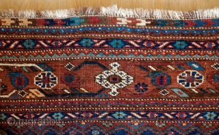 Khamseh Rug, Late 19th/early 20th Century.  Fantastic deep indigo blue ground.  Exceptional border.  Natural colors.  Possibly Arab Jabbareh group but the knots are symmetrical.  171 x 212  ...
