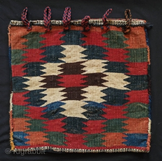 Qashqa'i saddle bag half, 4th quarter of the 19th century.  Great condition with thick pile.  Eye dazzler kilim back.  All natural dyes.  51 x 55 cm   