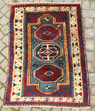 Lesghi Kazak small rug, first half of 20th century or earlier.  Hand spun lambs wool in saturated natural dyes in a fine weave.  The pile is full and plush.   ...