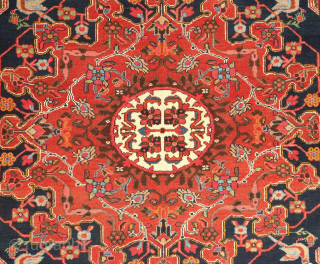Hamadan rug, late 19th, early 20th century.  It bears an exquisite central medallion in Chinese cloud band and cloud collar elements. The medallion is flanked with birds in the four corners.  ...