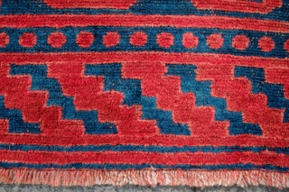 Kyrgyz Rug, 1900.  Khotan-Ningxia cloud-lattice design in the field.  The lighter spots on the image of the main rug are due to sun spots shining through the shade.  There  ...