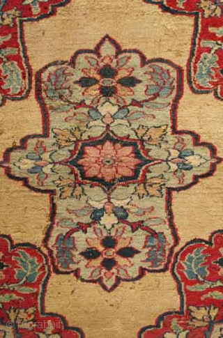 A small and fine eastern Persian rug, late 19th century.  Wonderful soft wool and elegant color combination.  Camel wool field.  Some moth nibbles in a few areas.  75  ...