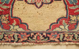 A small and fine eastern Persian rug, late 19th century.  Wonderful soft wool and elegant color combination.  Camel wool field.  Some moth nibbles in a few areas.  75  ...