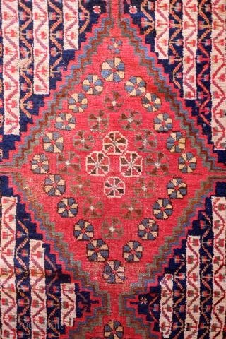 Khamseh-Qashqa'i Rug, 19th Century.  Kashmir shawl ground design with varying color schemes between the end sections and the center area with triple medallions. Selvedges mostly in tact with worn areas and  ...