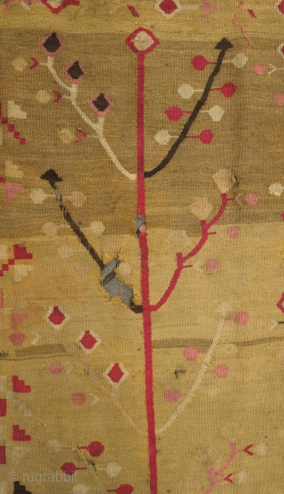 Balkan kilim, possibly Sharkoy, mid to 3rd quarter of the 19th century. Two trees of life in artfully evocative, spindly drawing.  The ground color is a soft green hue and the  ...