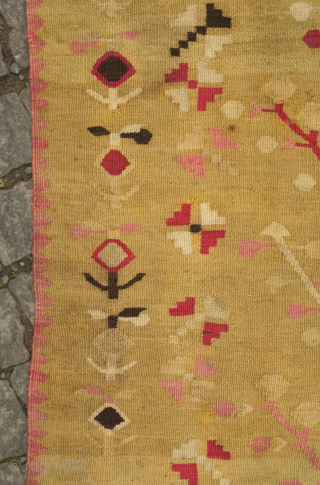 Balkan kilim, possibly Sharkoy, mid to 3rd quarter of the 19th century. Two trees of life in artfully evocative, spindly drawing.  The ground color is a soft green hue and the  ...