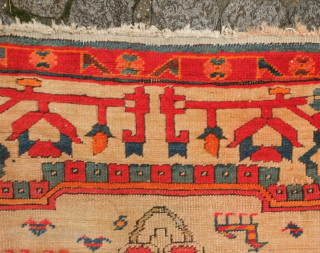 NW Persian rug, dated 1907. Central medallion and large pendant arrangement in a wild drawing. Goats in the field and human-like figures in the central medallion. Unusual. 105 x 227 cm  