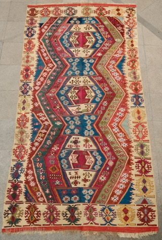 Malatya Rashwan Kilim, 4th Quarter of 19th century to early 20th century.  Gorgeous saturated colors.  In solid condition.  A section of the border has been repaired.  Faded colors  ...