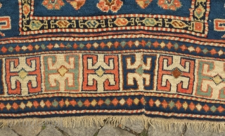 Karachof Kazak rug, 19th century.  Mellower shades in natural dyes.  In good condition with a reconnected tear at the bottom and some slightly lower pile in the medallions.    ...