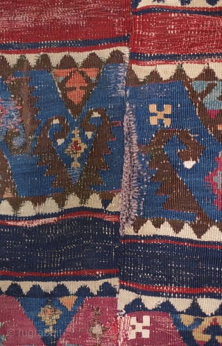 Sinanli kilim, 19th century. The motifs in green-blue have a wonderful archaic drawing.  Areas throughout have been stitched over to secure them in the older way of repai but it is  ...