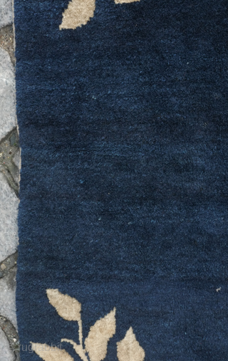 Peking Chinese square rug, 19th century.  There are rooster motifs in the center roundel and in each of the four corners on a field of deep indigo as well as a  ...