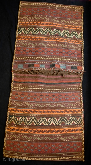 Kohistani saddle bag from Badghis area of Afghanistan.  Late 19th Century.  This has a beautiful striped back in natural colors.  Colors are all good.  Some of these bags  ...