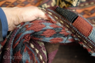 Kohistani saddle bag from Badghis area of Afghanistan.  Late 19th Century.  This has a beautiful striped back in natural colors.  Colors are all good.  Some of these bags  ...