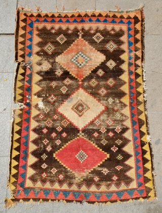 Gabbeh rug, 3rd quarter of the 19th century, Possibly older.  Fantastic design and colors. Worn but mostly there.  A small blue stain in the white diamond.  129 x 185  ...