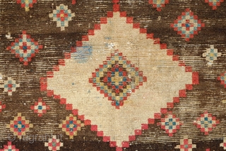 Gabbeh rug, 3rd quarter of the 19th century, Possibly older.  Fantastic design and colors. Worn but mostly there.  A small blue stain in the white diamond.  129 x 185  ...