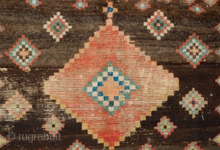 Gabbeh rug, 3rd quarter of the 19th century, Possibly older.  Fantastic design and colors. Worn but mostly there.  A small blue stain in the white diamond.  129 x 185  ...