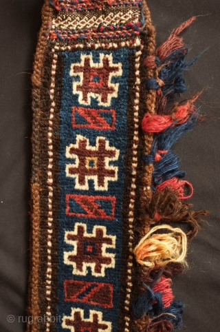 Baluch Camel neck colar. 19th Century.  Almost all good colors with some fading in the red tassel and in some of the white pile.  Overall good condition with wear in  ...