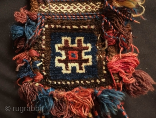 Baluch Camel neck colar. 19th Century.  Almost all good colors with some fading in the red tassel and in some of the white pile.  Overall good condition with wear in  ...