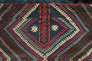 Marash jijim clothing bag. 19th century.  This ethnographic bag has a deep indigo ground and seven colors in the jijim work. These were used to store valuable clothing items. Wonderful colors  ...