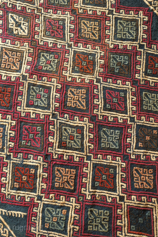 Marash jijim clothing bag. 19th century.  This ethnographic bag has a deep indigo ground and seven colors in the jijim work. These were used to store valuable clothing items. Wonderful colors  ...