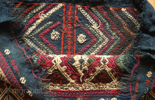 Marash jijim clothing bag. 19th century.  This ethnographic bag has a deep indigo ground and seven colors in the jijim work. These were used to store valuable clothing items. Wonderful colors  ...