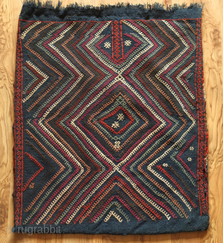Marash jijim clothing bag. 19th century.  This ethnographic bag has a deep indigo ground and seven colors in the jijim work. These were used to store valuable clothing items. Wonderful colors  ...