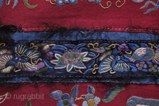 Chinese early 20th century embroidery.  Silk and gold thread.  Playful yet slightly ferocious fu dog design surrounded by 100 antique motifs.  Fish and butterfly motifs appear.  Base fabric  ...