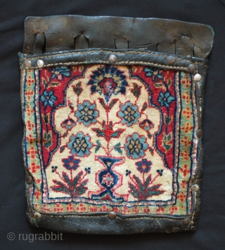 Kashan area pile and leather chanteh, 19th century.  These were made to be made to be worn on a belt for a special purpose. 25 x 30 cm    