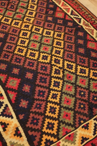 Veramin Afshar Kilim, Late 19th century. Good array of colors including a deep purple.   
 141 x 212 cm            