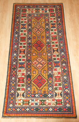 Shirvan rug, 19th century.  Deep yellow field.  Fantastic condition with good pile.    112 x 228 cm. Excellent range of colors numbering 7 or 8 colors including a  ...